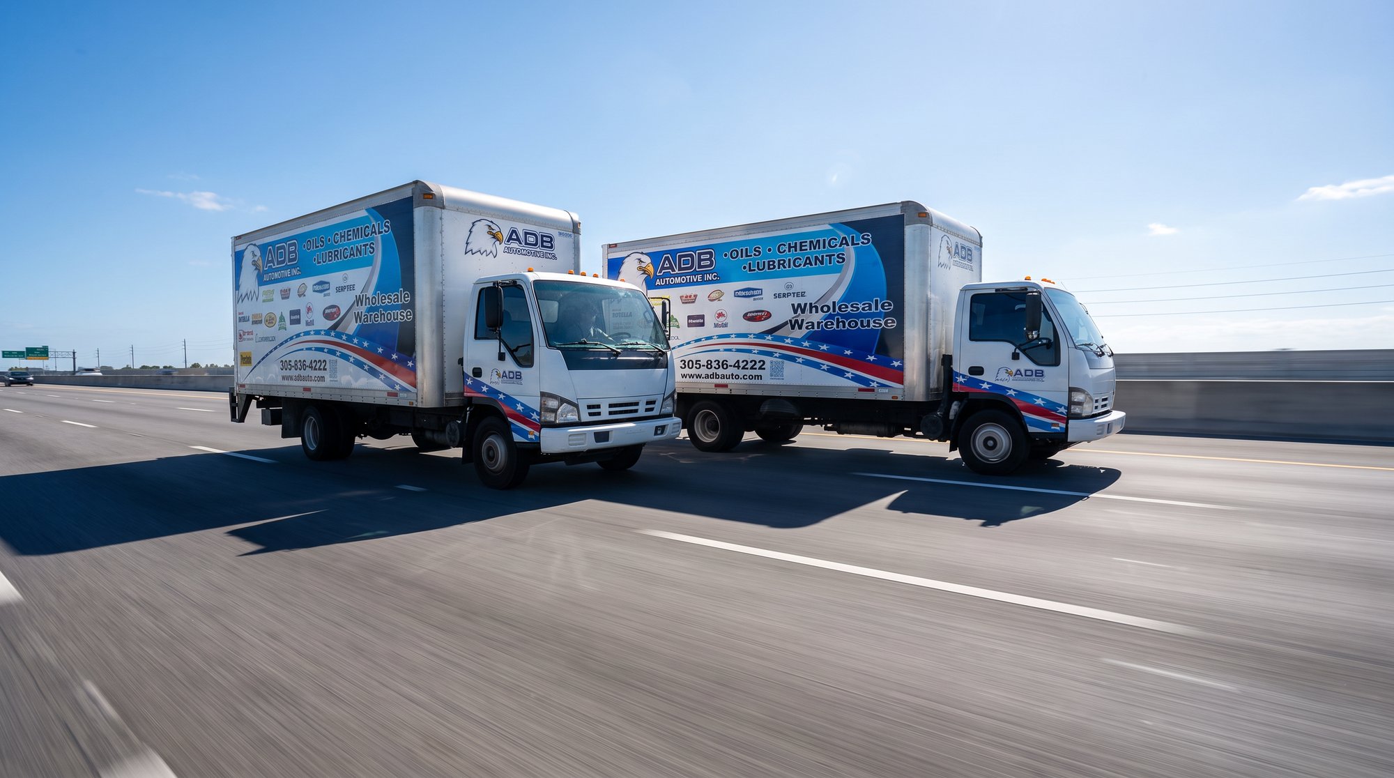 ADB Automotive delivery vans on the highway